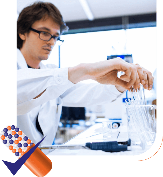 A man in white lab coat working with a glass.