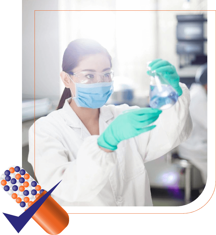 A woman in white lab coat holding up a bottle.